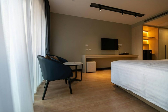 Imagen de la habitación del Hotel Lewit Pattaya, A Member Of Radisson Individuals. Foto 11