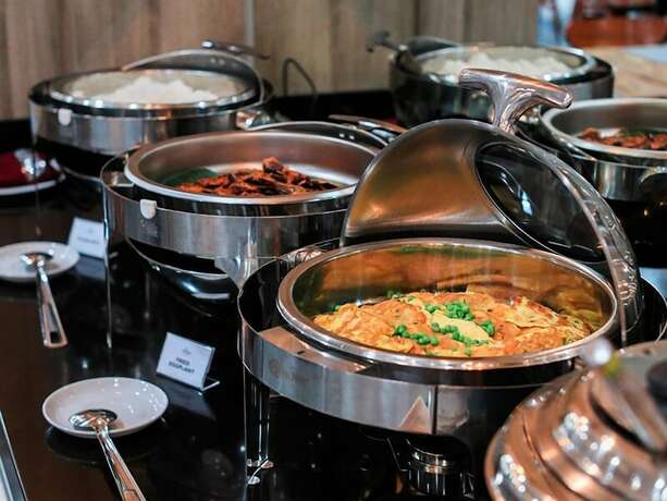 Imagen del bar/restaurante del Hotel Lex Banjarmasin By Excelsior. Foto 3