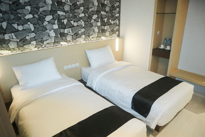 Imagen de la habitación del Hotel Lex Banjarmasin By Excelsior. Foto 5