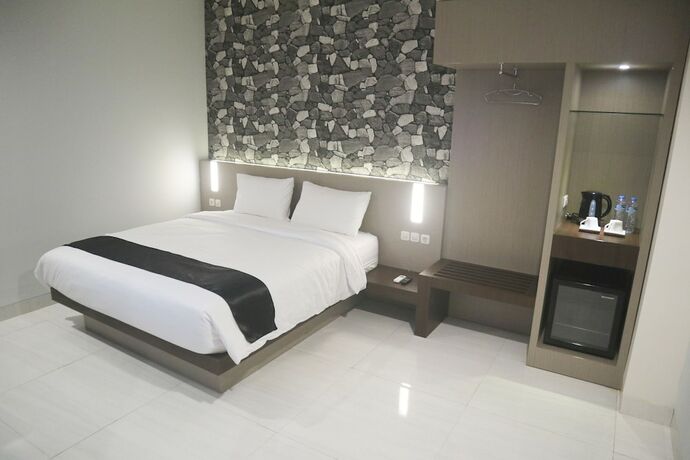 Imagen de la habitación del Hotel Lex Banjarmasin By Excelsior. Foto 6