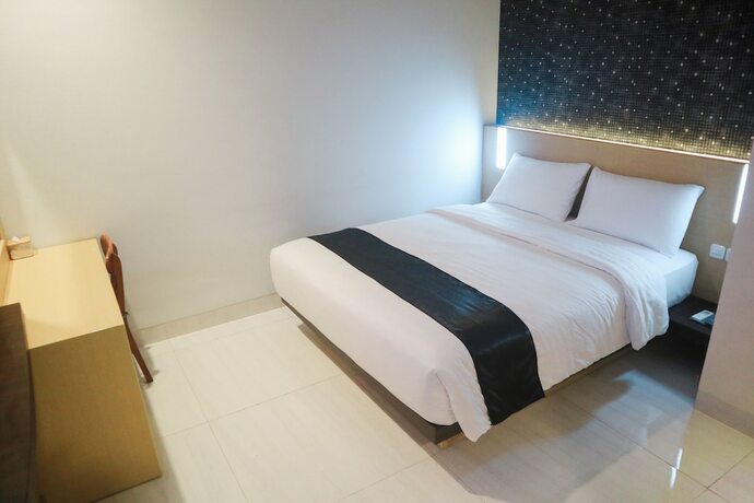 Imagen de la habitación del Hotel Lex Banjarmasin By Excelsior. Foto 7