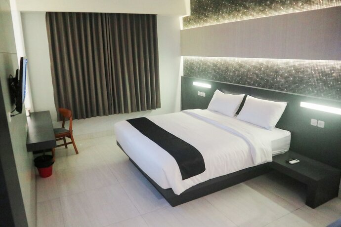 Imagen de la habitación del Hotel Lex Banjarmasin By Excelsior. Foto 9