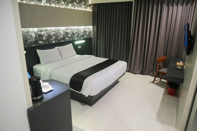 Imagen de la habitación del Hotel Lex Banjarmasin By Excelsior. Foto 10