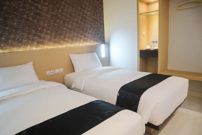 Imagen de la habitación del Hotel Lex Banjarmasin By Excelsior. Foto 11