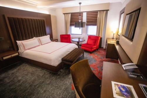 Imagen de la habitación del Hotel Lexington Plaza. Foto 5