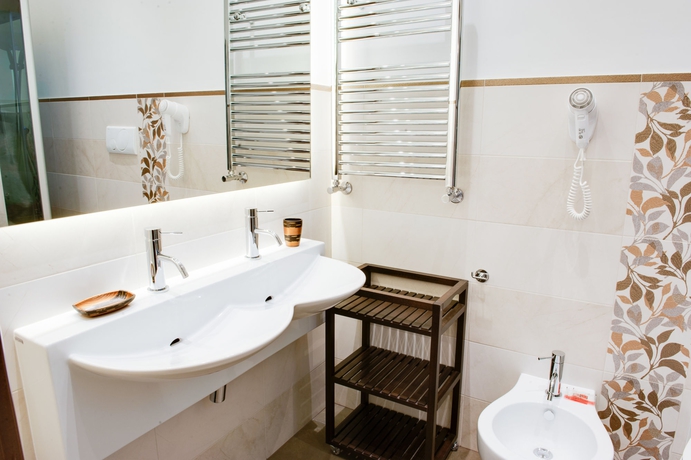 Imagen de la habitación del Hotel Lh Royal Suites. Foto 8