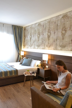 Imagen de la habitación del Hotel Lh Sirio Venice. Foto 10