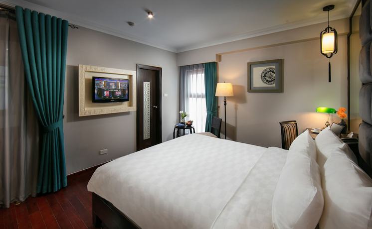 Imagen de la habitación del Hotel L'h&Ocirc;tel Du Lac Hanoi. Foto 11