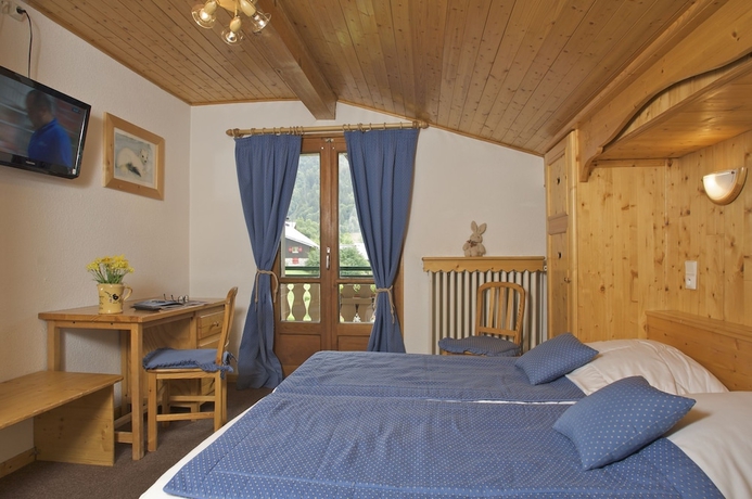 Imagen de la habitación del Hotel L'hermine Blanche. Foto 4