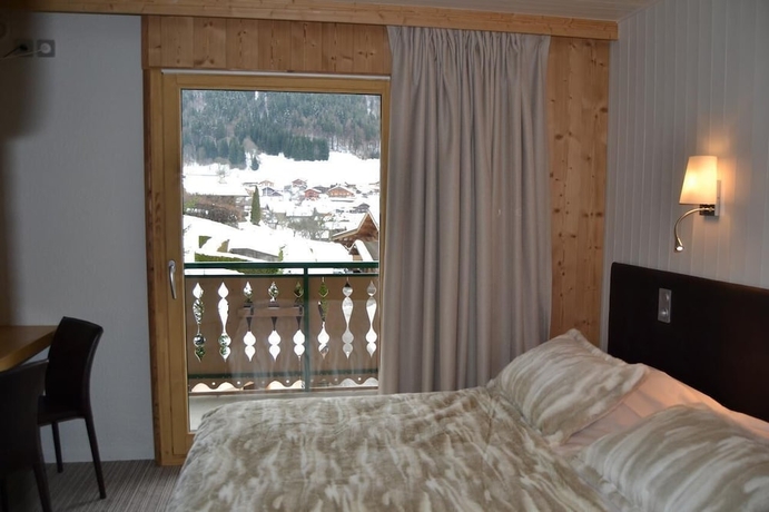 Imagen de la habitación del Hotel L'hermine Blanche. Foto 9