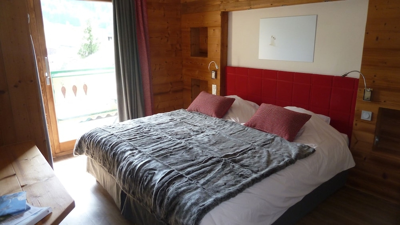 Imagen de la habitación del Hotel L'hermine Blanche. Foto 11
