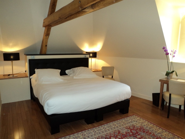 Imagen de la habitación del Hotel L'hôtel De Beaune. Foto 6