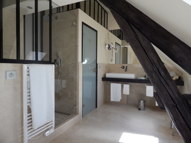 Imagen de la habitación del Hotel L'hôtel De Beaune. Foto 12