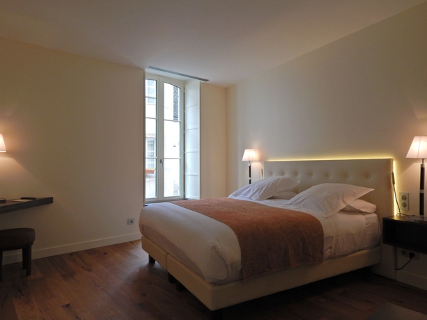 Imagen de la habitación del Hotel L'hôtel De Beaune. Foto 13