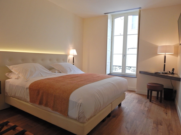 Imagen de la habitación del Hotel L'hôtel De Beaune. Foto 14