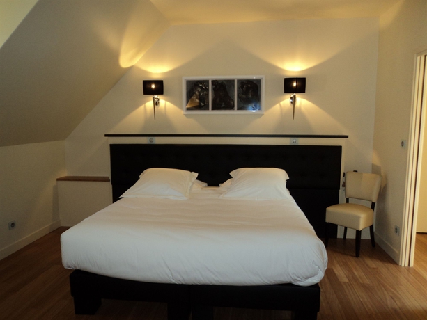Imagen de la habitación del Hotel L'hôtel De Beaune. Foto 15