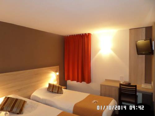 Imagen de la habitación del Hotel L'h&ocirc;tel Des Trois Massifs. Foto 4