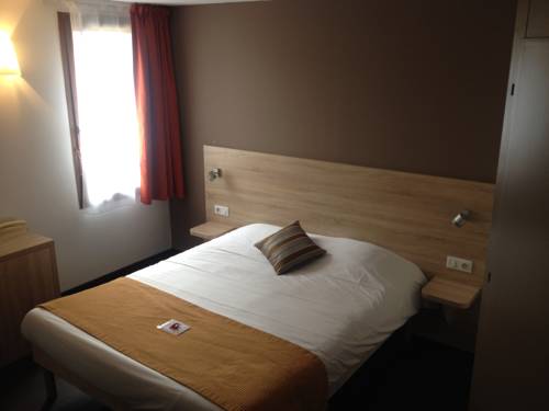 Imagen de la habitación del Hotel L'h&ocirc;tel Des Trois Massifs. Foto 6