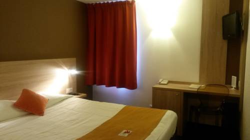 Imagen de la habitación del Hotel L'h&ocirc;tel Des Trois Massifs. Foto 7