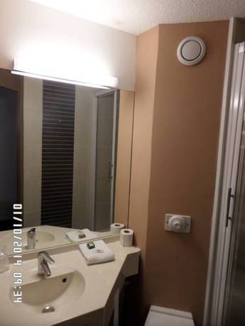 Imagen de la habitación del Hotel L'h&ocirc;tel Des Trois Massifs. Foto 9