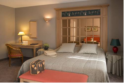 Imagen de la habitación del Hotel L'h&ocirc;tel Europe. Foto 7