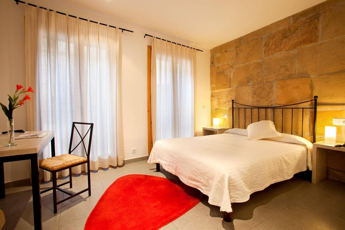 Imagen de la habitación del Hotel L'hostal D'interior. Foto 4