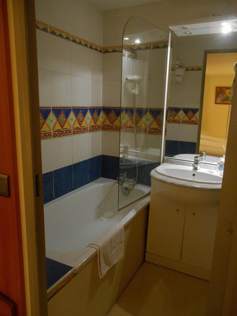 Imagen de la habitación del Hotel L'hotel By Joa. Foto 12