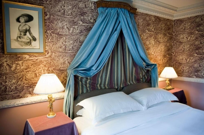 Imagen de la habitación del Hotel L'hotel, París. Foto 3