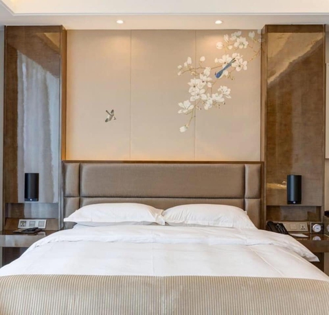 Imagen de la habitación del Hotel Li Cai Tian Qi Xianyang. Foto 2