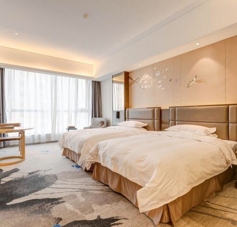 Imagen de la habitación del Hotel Li Cai Tian Qi Xianyang. Foto 4