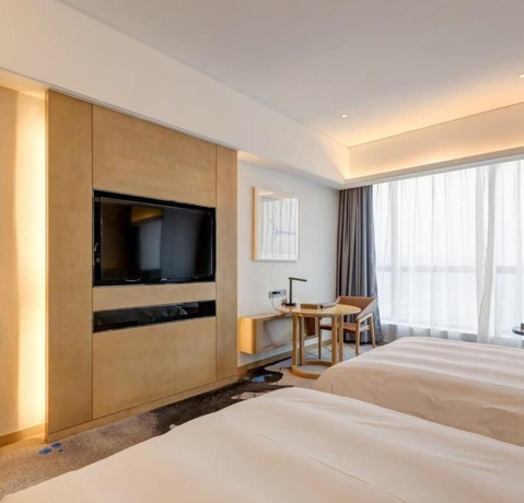 Imagen de la habitación del Hotel Li Cai Tian Qi Xianyang. Foto 5