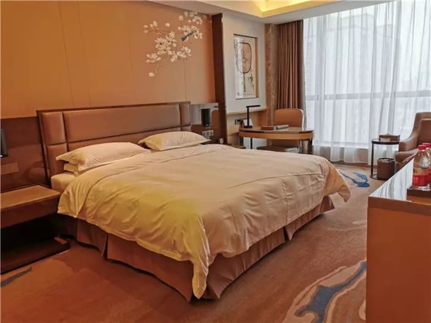 Imagen de la habitación del Hotel Li Cai Tian Qi Xianyang. Foto 6