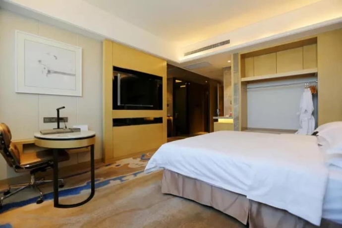 Imagen de la habitación del Hotel Li Cai Tian Qi Xianyang. Foto 9