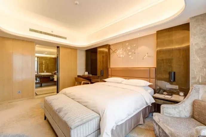 Imagen de la habitación del Hotel Li Cai Tian Qi Xianyang. Foto 10