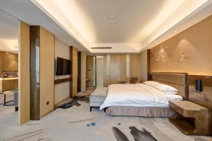 Imagen de la habitación del Hotel Li Cai Tian Qi Xianyang. Foto 11