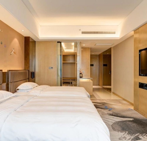 Imagen de la habitación del Hotel Li Cai Tian Qi Xianyang. Foto 12