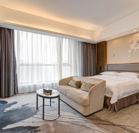 Imagen de la habitación del Hotel Li Cai Tian Qi Xianyang. Foto 13