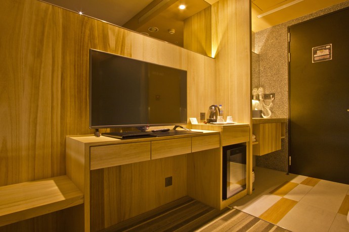 Imagen de la habitación del Hotel Li Duo Best. Foto 2