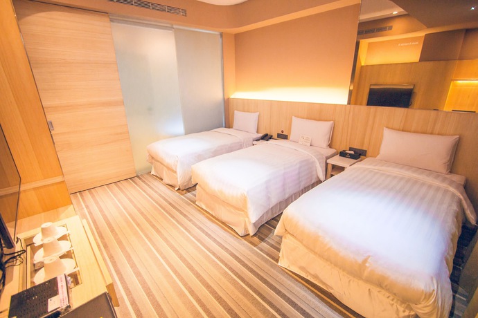 Imagen de la habitación del Hotel Li Duo Best. Foto 3