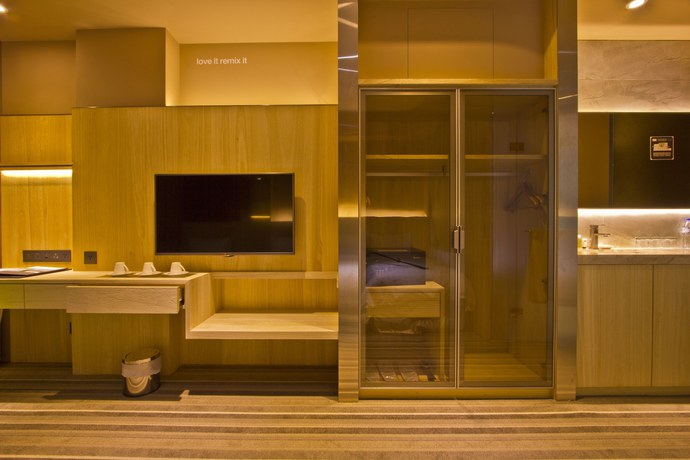 Imagen de la habitación del Hotel Li Duo Best. Foto 5