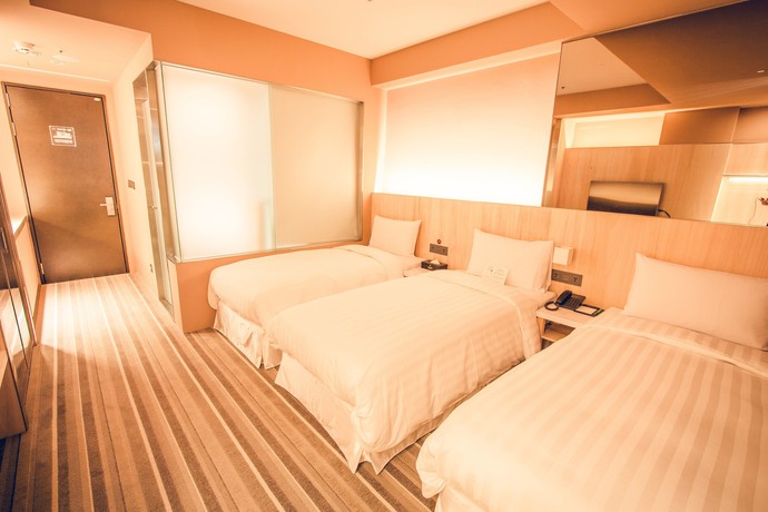 Imagen de la habitación del Hotel Li Duo Best. Foto 6