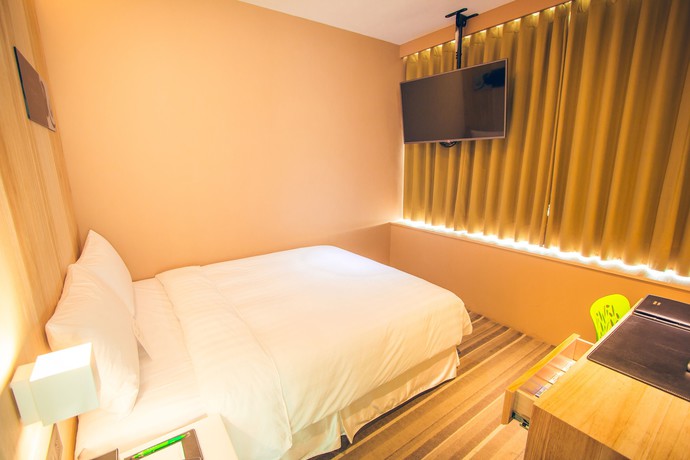 Imagen de la habitación del Hotel Li Duo Best. Foto 10