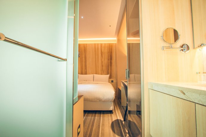 Imagen de la habitación del Hotel Li Duo Best. Foto 12