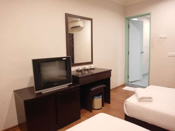 Imagen de la habitación del Hotel Li Garden. Foto 4