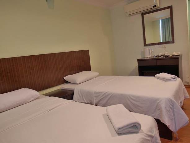 Imagen de la habitación del Hotel Li Garden. Foto 6