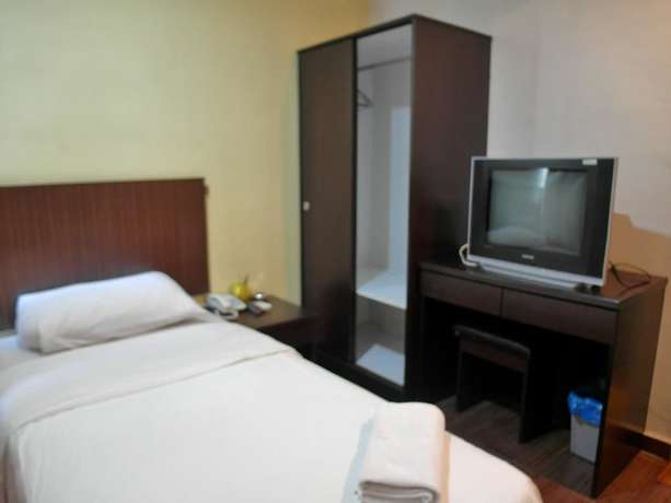 Imagen de la habitación del Hotel Li Garden. Foto 7