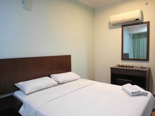 Imagen de la habitación del Hotel Li Garden. Foto 9
