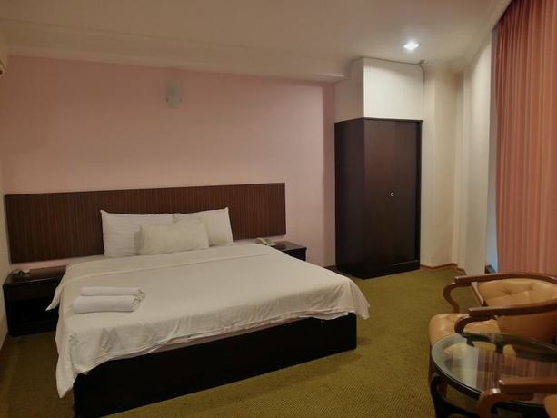 Imagen de la habitación del Hotel Li Garden. Foto 10