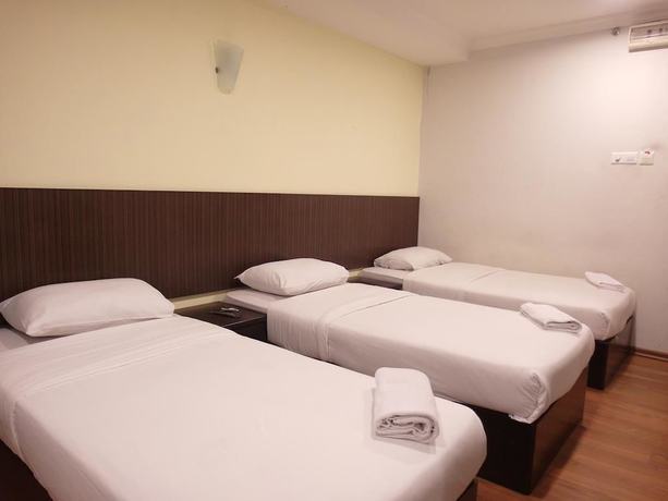 Imagen de la habitación del Hotel Li Garden. Foto 13