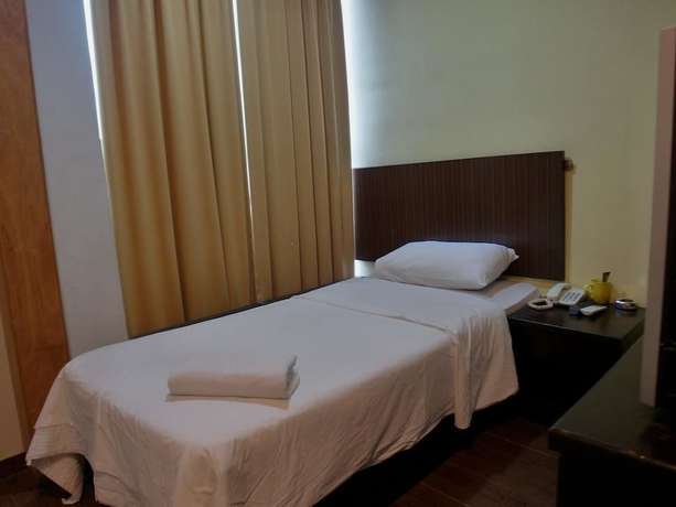 Imagen de la habitación del Hotel Li Garden. Foto 14